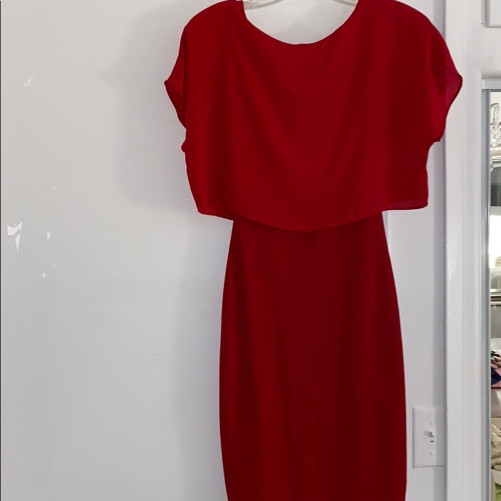 red dress with shear overlay on part of the dress